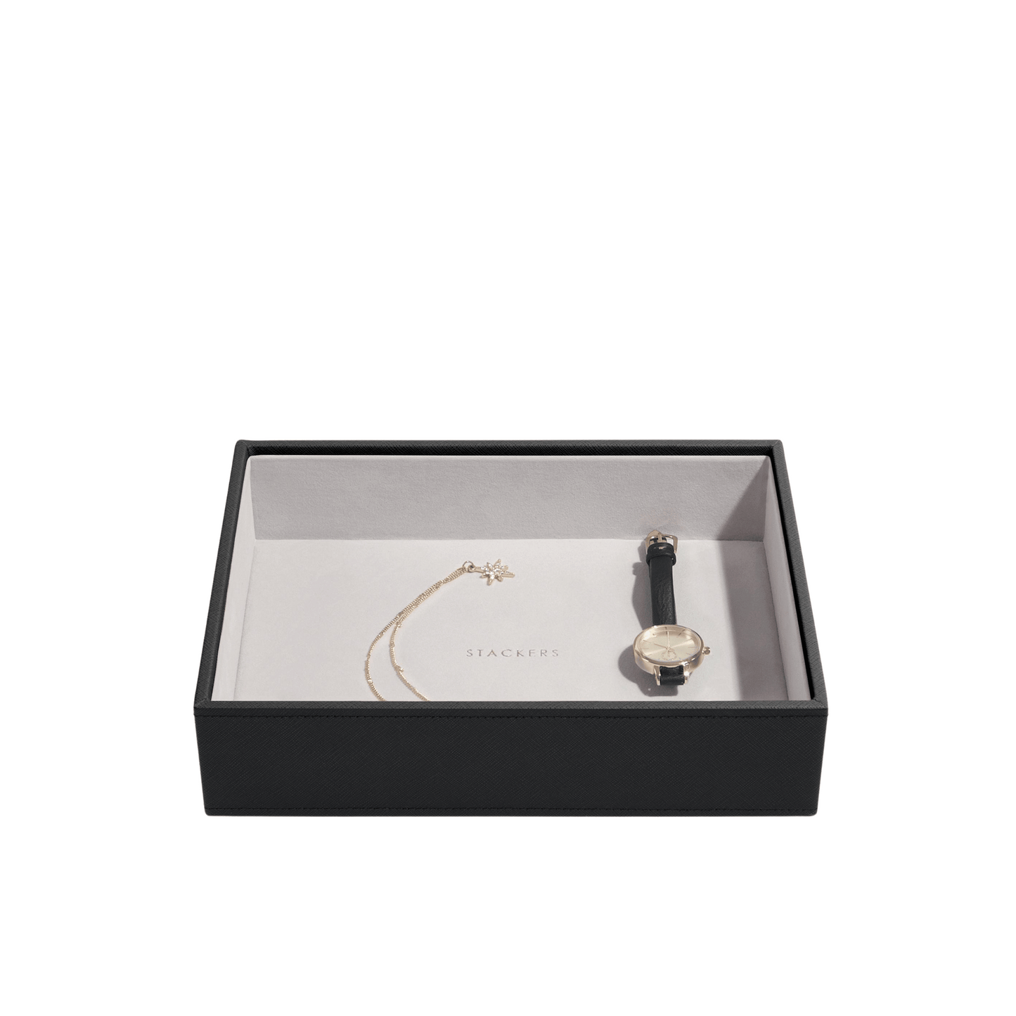 Stackers jewelry box in black with a watch and necklace on a white background